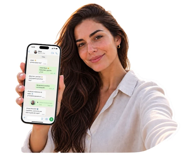 Woman holding a phone showing a Spanish Chat conversation